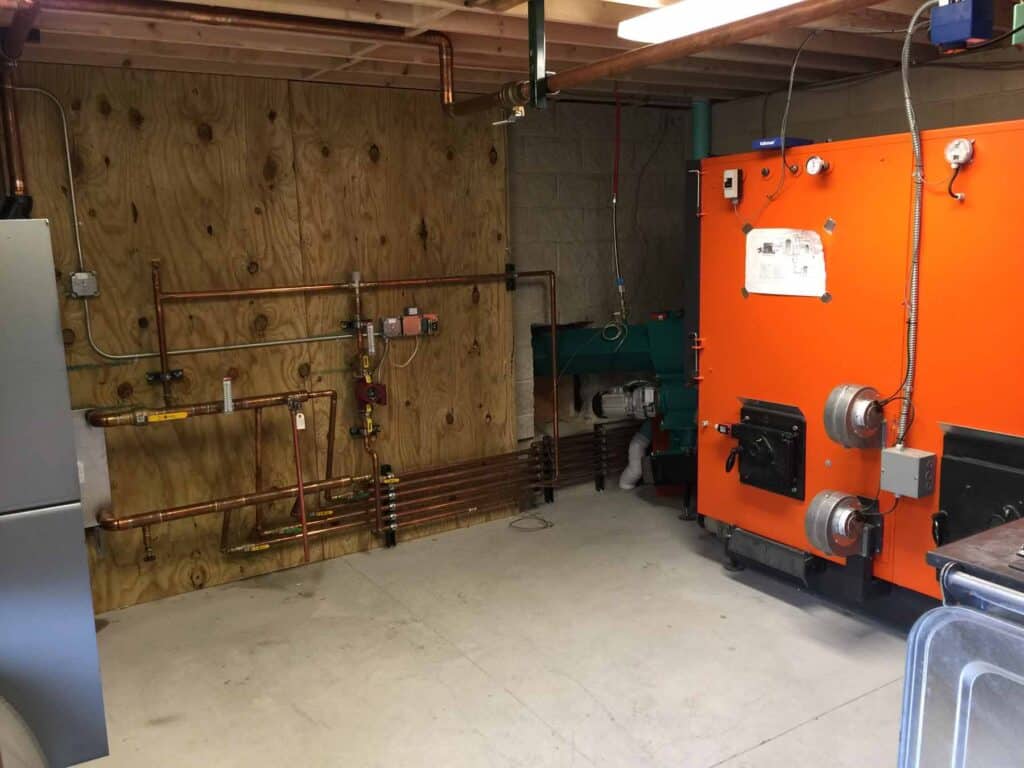 wood chip boiler, wood pellet boiler, biomass heating equipment, biofuels, carbon neutral, renewable energy, wood pellet furnace, wood chip furnace, combined heat and energy, Caluwe, Inc, Boston, MA