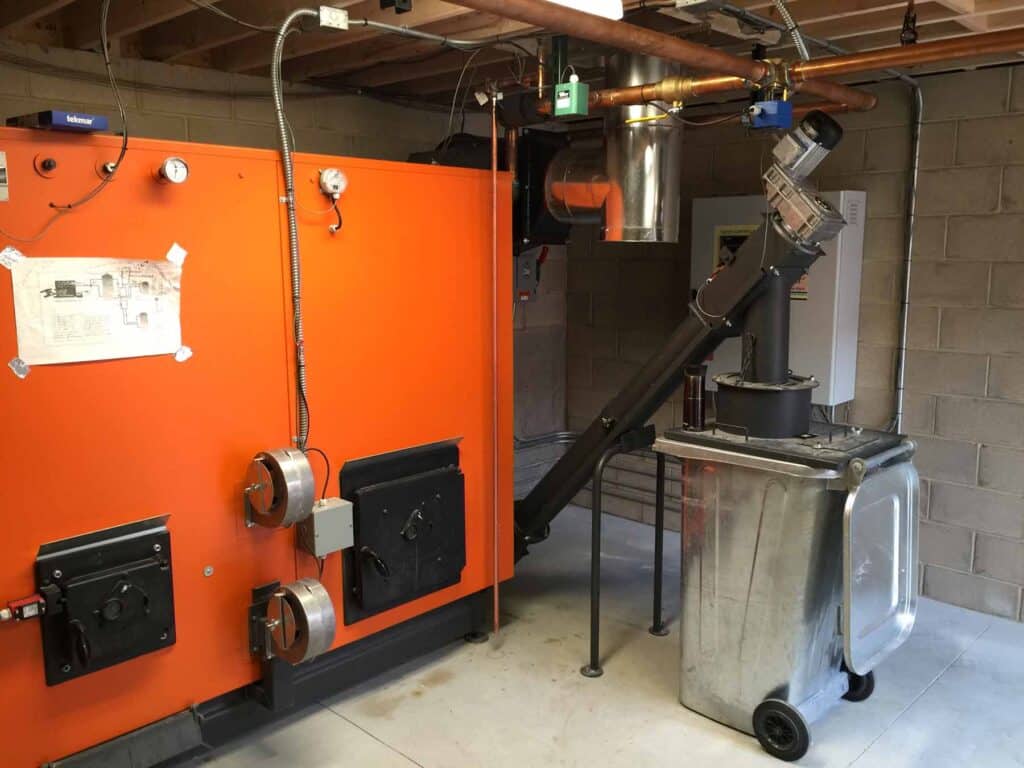 wood chip boiler, wood pellet boiler, biomass heating equipment, biofuels, carbon neutral, renewable energy, wood pellet furnace, wood chip furnace, combined heat and energy, Caluwe, Inc, Boston, MA