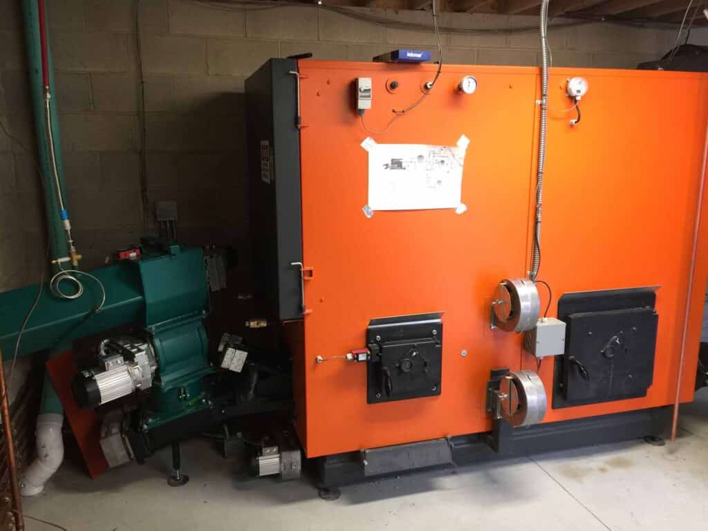 wood chip boiler, wood pellet boiler, biomass heating equipment, biofuels, carbon neutral, renewable energy, wood pellet furnace, wood chip furnace, combined heat and energy, Caluwe, Inc, Boston, MA