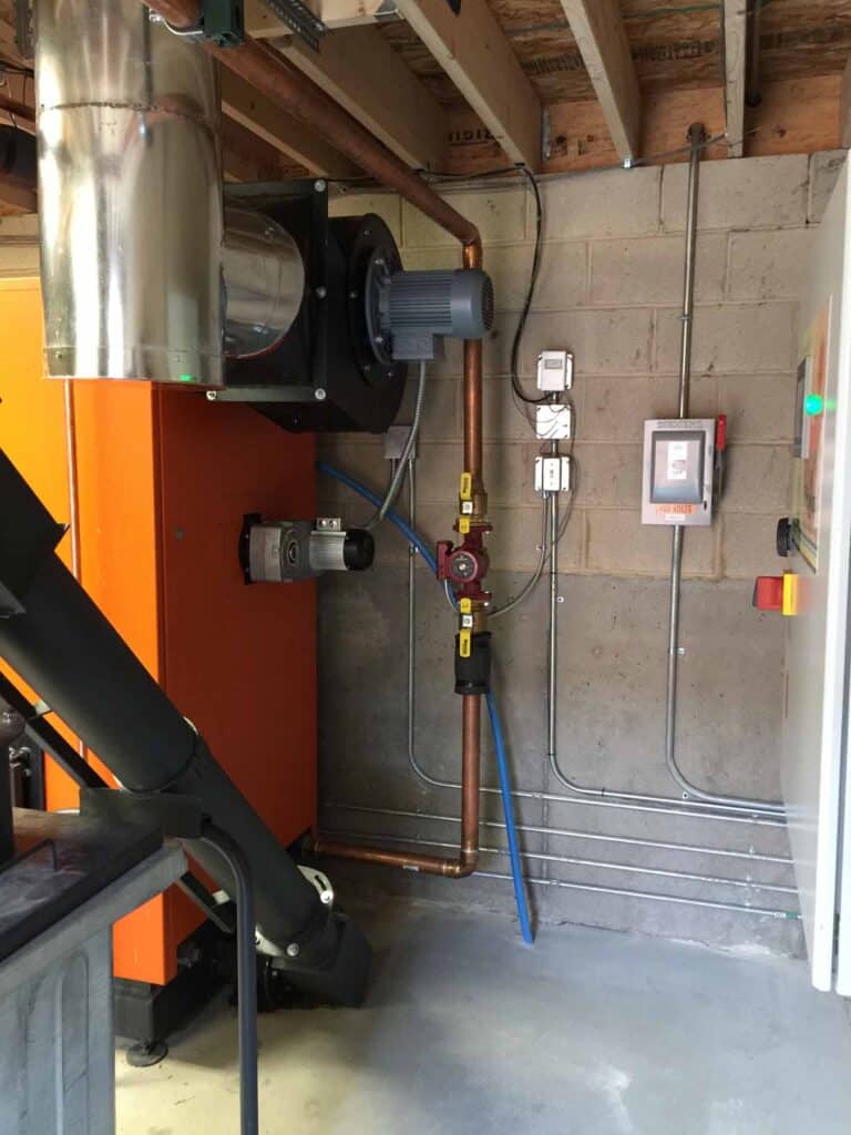 wood chip boiler, wood pellet boiler, biomass heating equipment, biofuels, carbon neutral, renewable energy, wood pellet furnace, wood chip furnace, combined heat and energy, Caluwe, Inc, Boston, MA