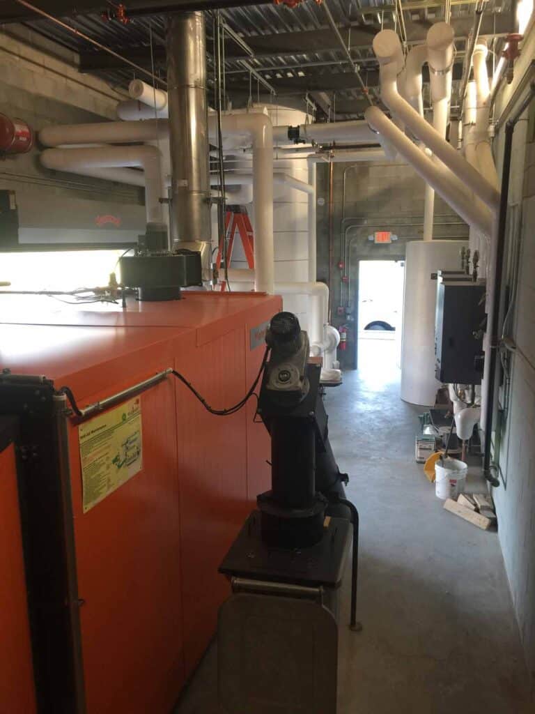 wood chip boiler, wood pellet boiler, biomass heating equipment, biofuels, carbon neutral, renewable energy, wood pellet furnace, wood chip furnace, combined heat and energy, Caluwe, Inc, Boston, MA