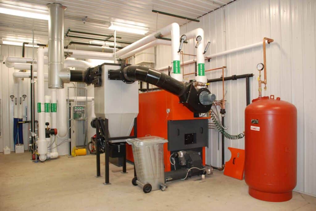 wood chip boiler, wood pellet boiler, biomass heating equipment, biofuels, carbon neutral, renewable energy, wood pellet furnace, wood chip furnace, combined heat and energy, Caluwe, Inc, Boston, MA, thermal storage tank