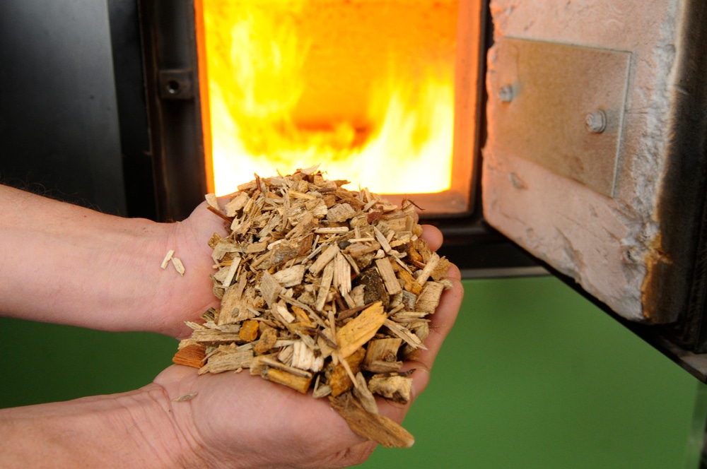 heating,with,woodchips,at,home, wood pellet boilers, wood chip boilers, biofuels, biomass energy, renewable energy, Caluwe, Inc, Boston, MA, commercial biomass boiler systems, CHP combined heat and power systems